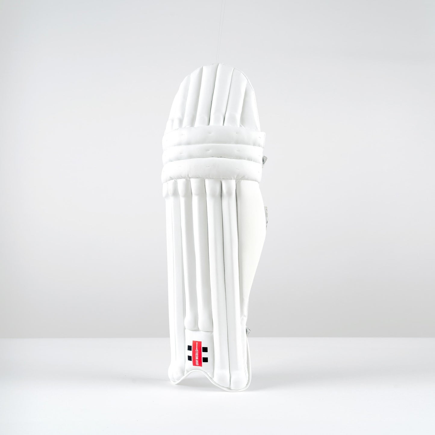 Front view of Gray-Nicolls Classic Academy white cricket batting pads