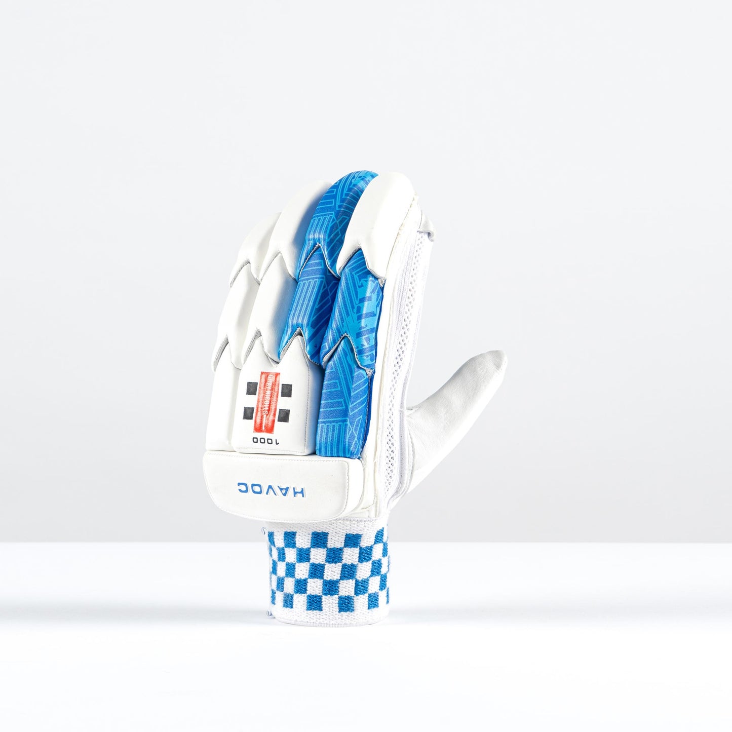 back view of Gray Nicolls Havoc 1.0 gloves showing split fingers and blue checkered wristbands