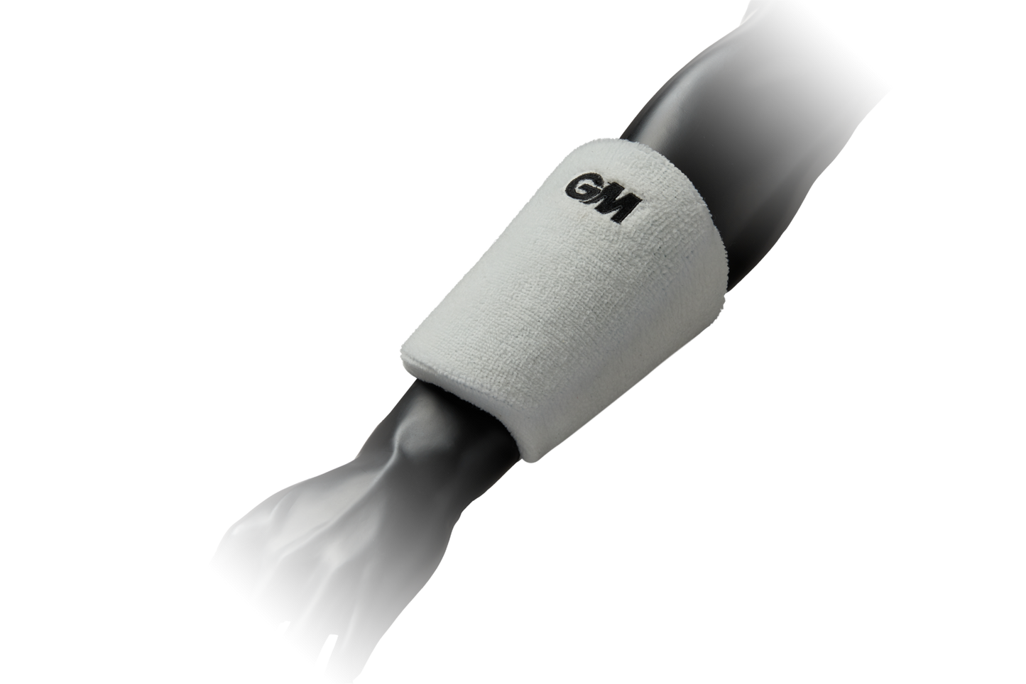 GM wrist guard top down view on arm in white with black GM branding