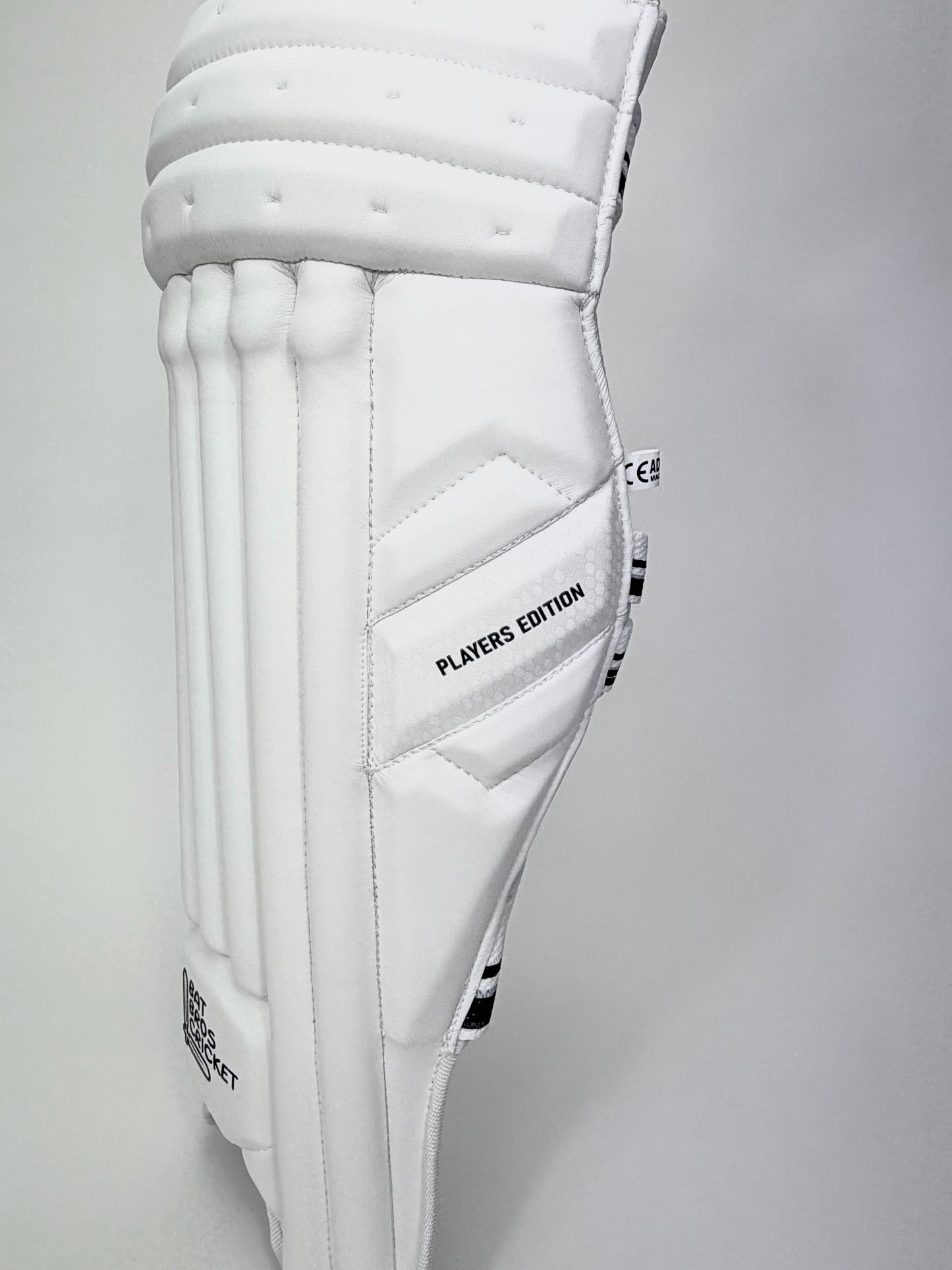 Side profile view showing contoured design and thick side wing padding
