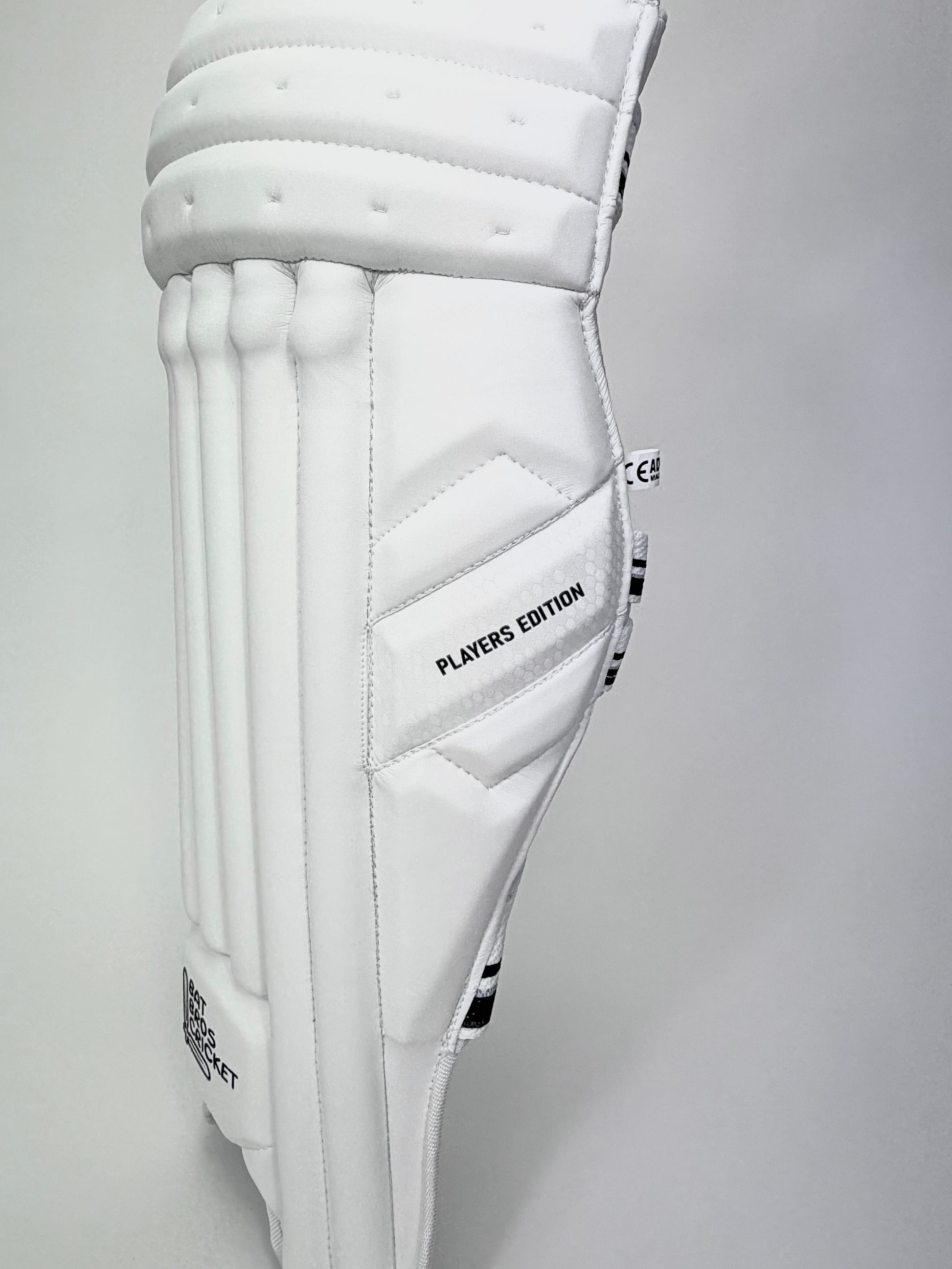 Side profile view showing contoured design and thick side wing padding
