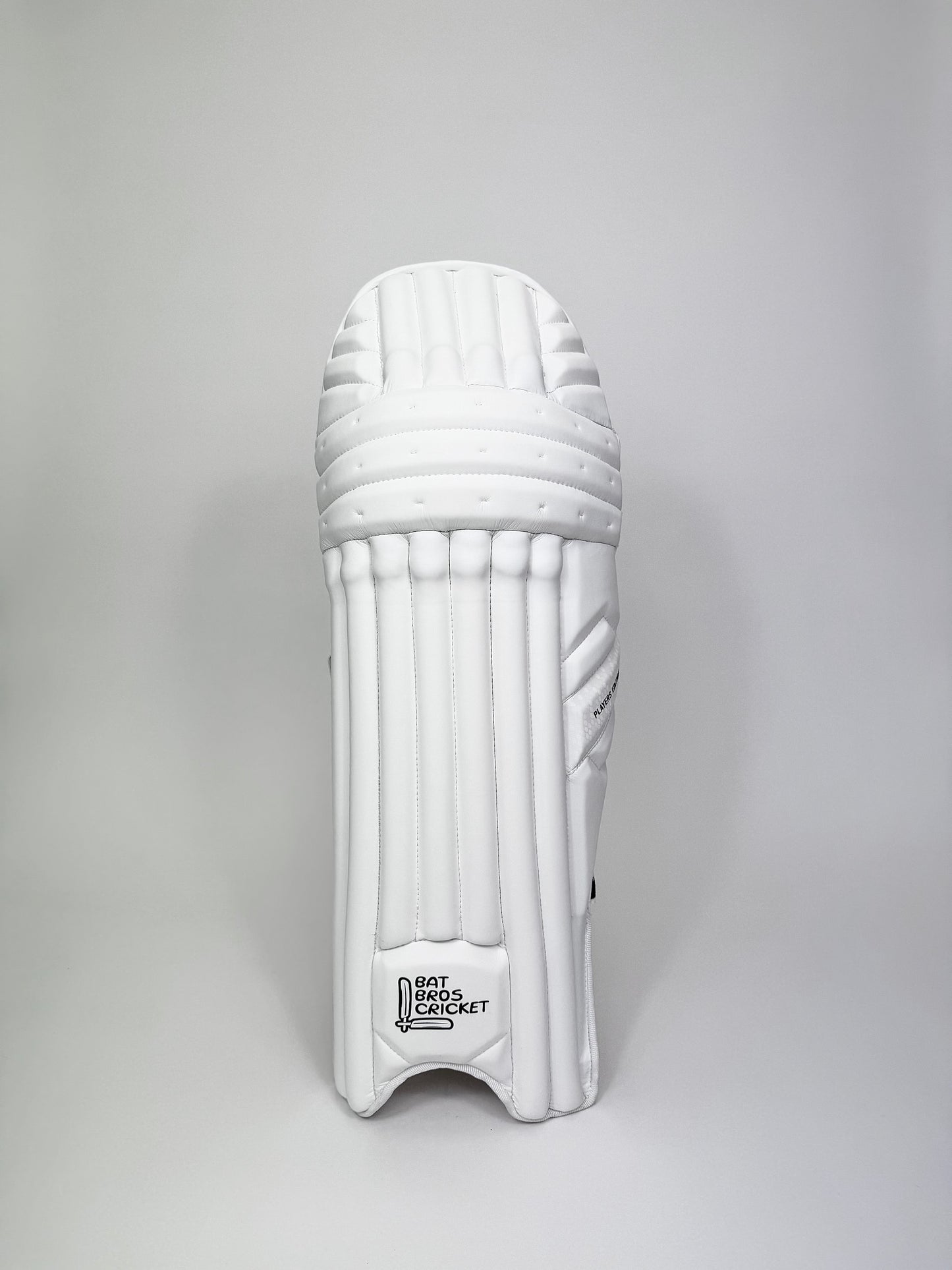 Single pad front view with detailed face design and premium finish
