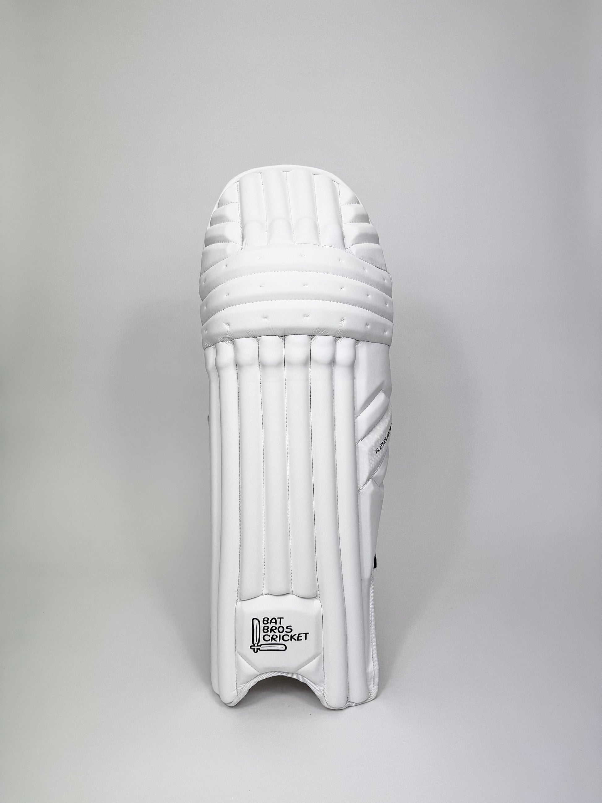 Single pad front view with detailed face design and premium finish
