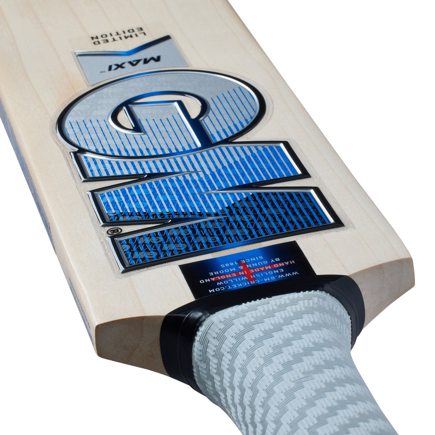 Close-up of GM Maxi 606 cricket bat handle with treble spring cane grip