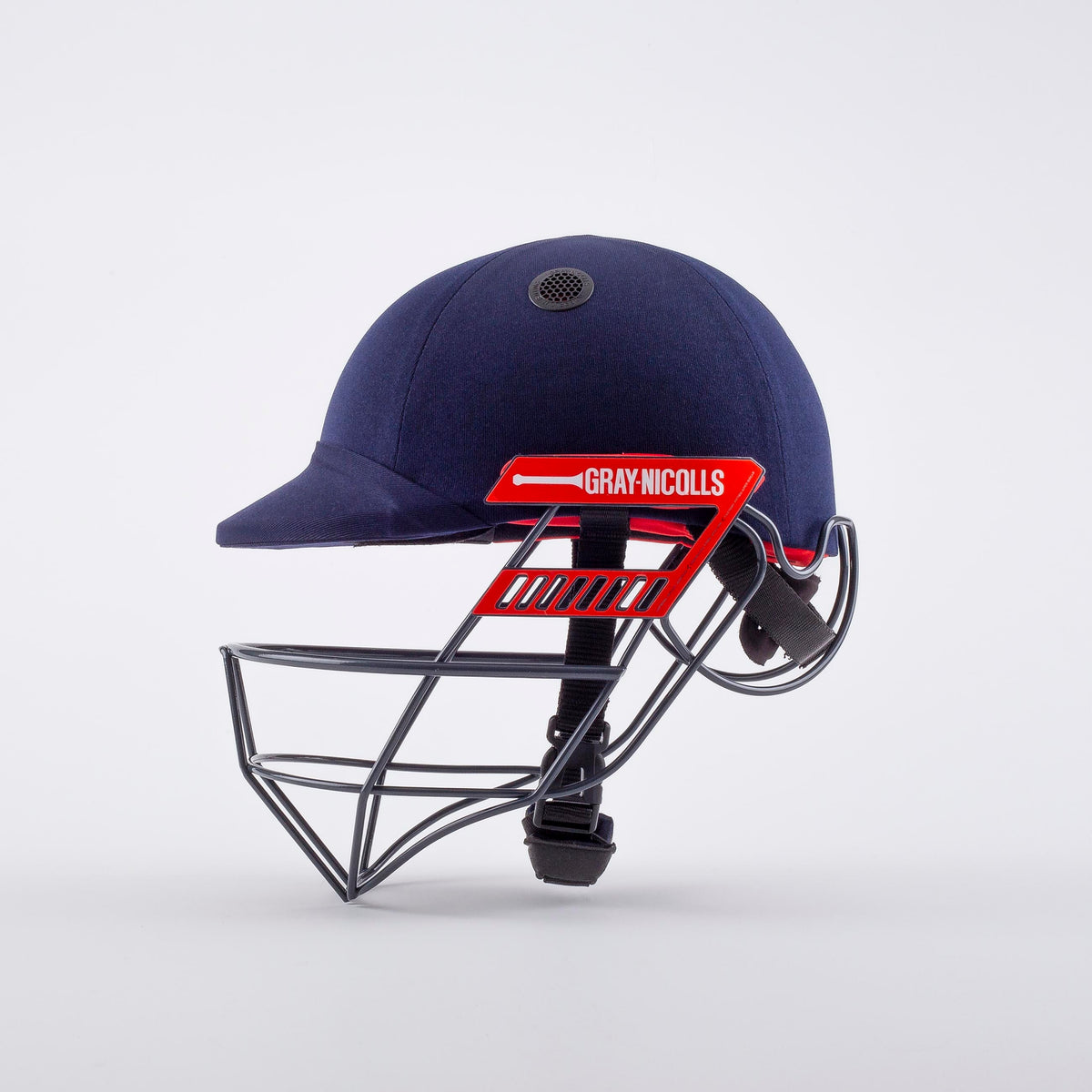 side profile of Gray-Nicolls Atomic 360 Helmet in navy with ventilation design