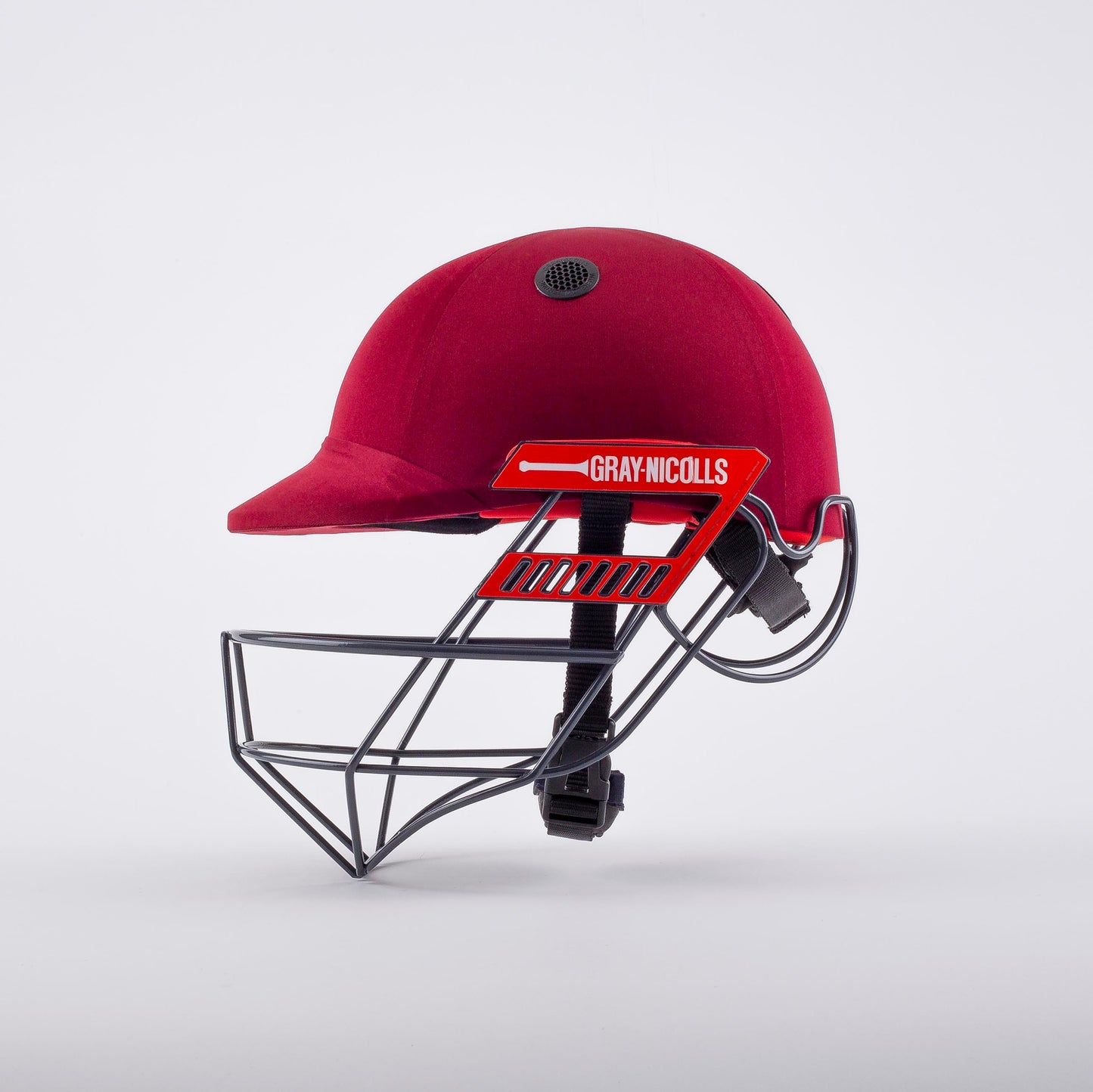 side view of Atomic 360 Batting Helmet in red with factory-fitted faceguard