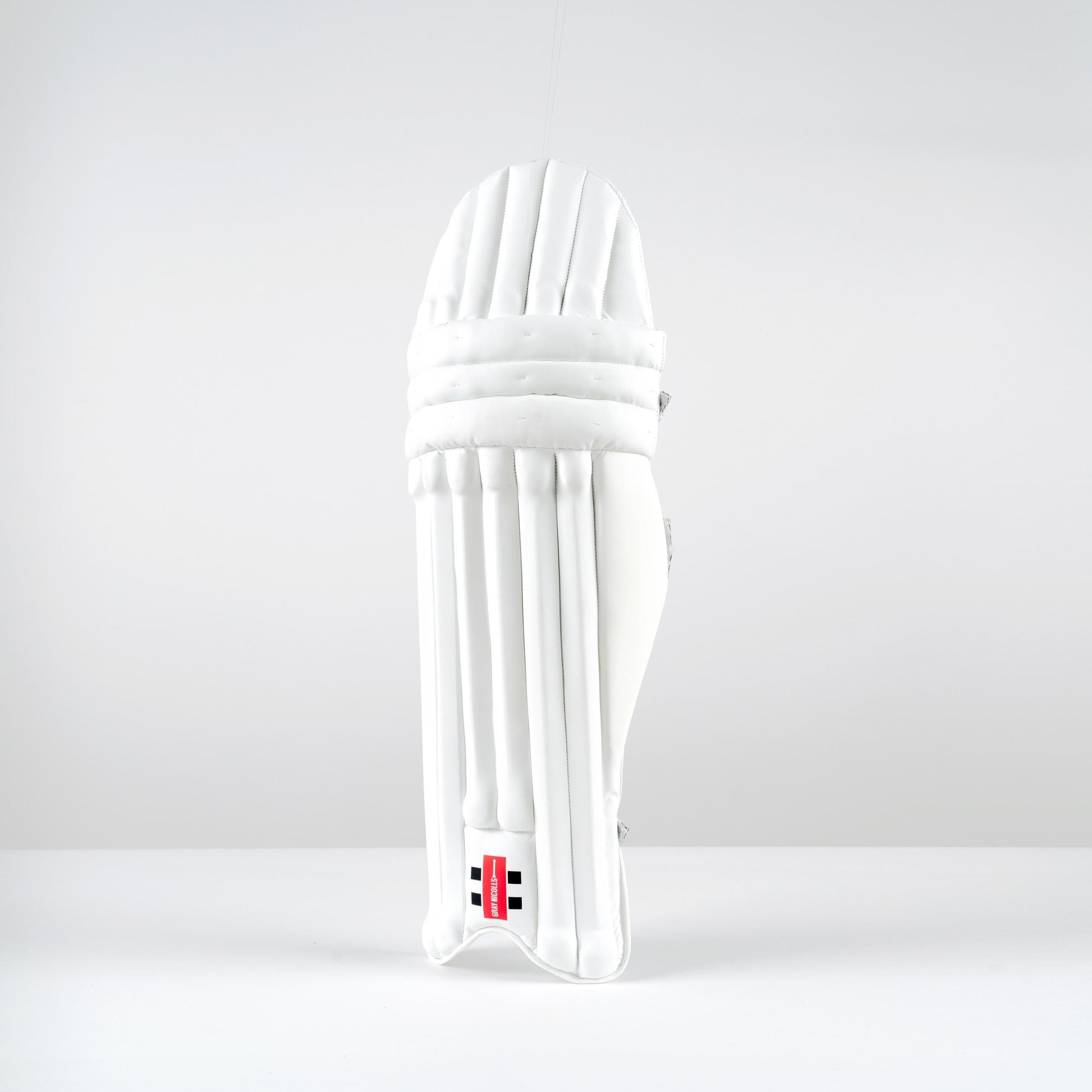 Front view of Gray-Nicolls Classic Academy white cricket batting pads