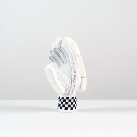 Close-up angle of thumb protection and wrist strap of Academy glove