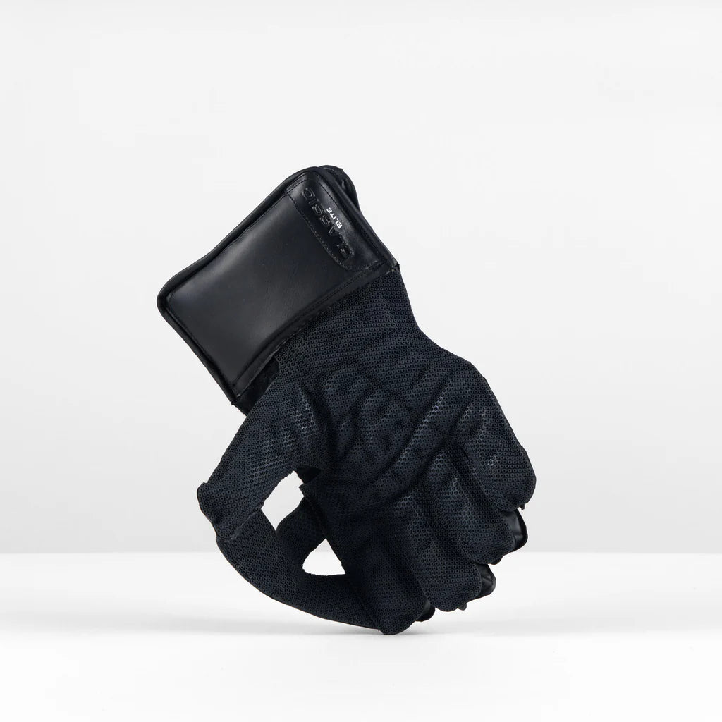 Gray Nicolls Classic Elite black wicket keeping gloves angled view