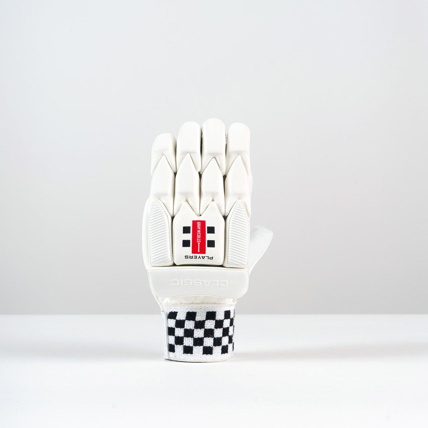 angled view of left-hand Gray-Nicolls Classic Players Batting Glove showing finger design