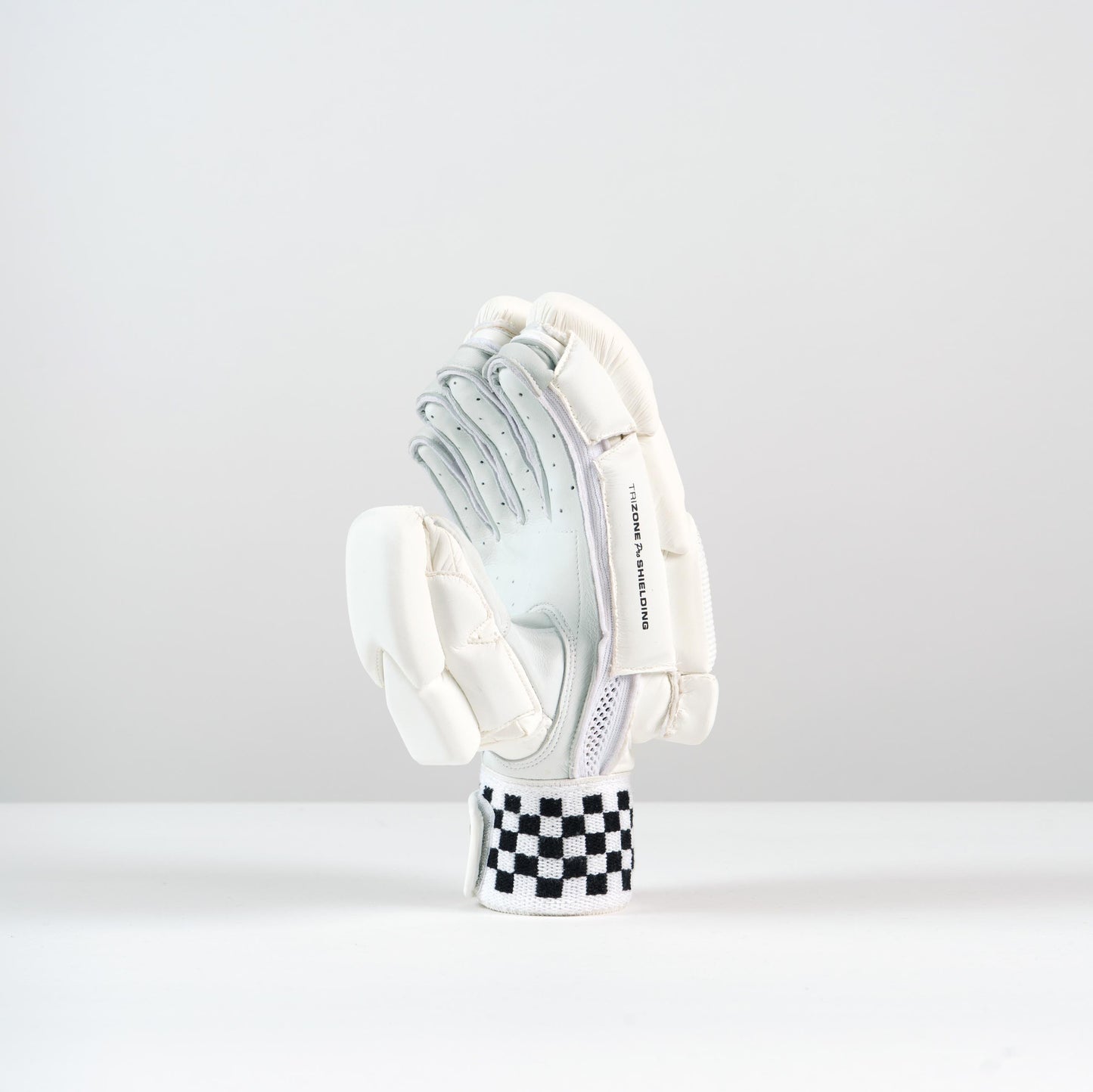 angled view of right-hand Gray-Nicolls Classic Players Batting Glove showing thumb protection