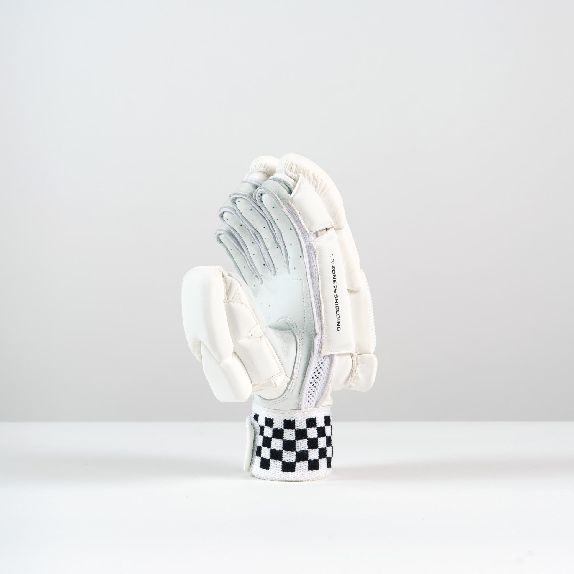 angled view of right-hand Gray-Nicolls Classic Players Batting Glove showing thumb protection