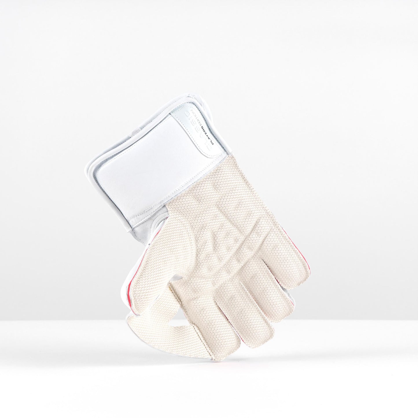 open palm view of Gray-Nicolls Classic gloves showing octopus grip texture