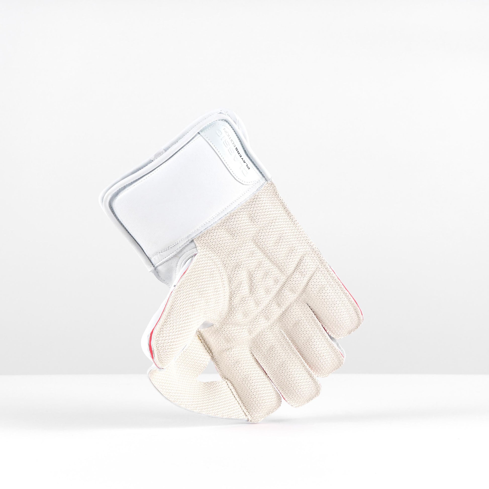 open palm view of Gray-Nicolls Classic gloves showing octopus grip texture