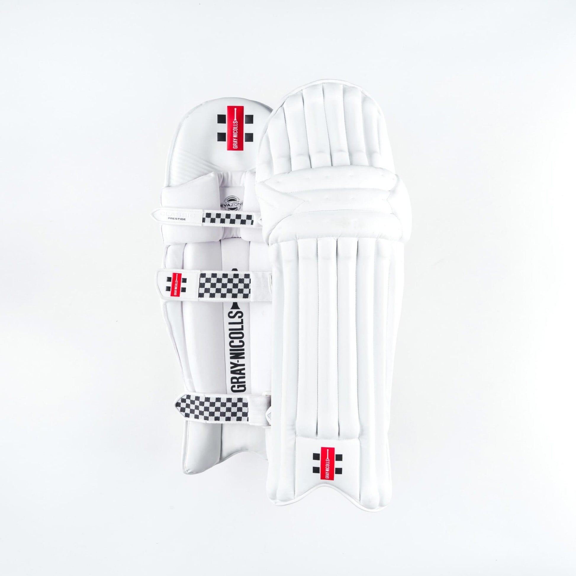 Gray-Nicolls Classic Prestige batting pads in white showing front and back with premium padding and strap design
