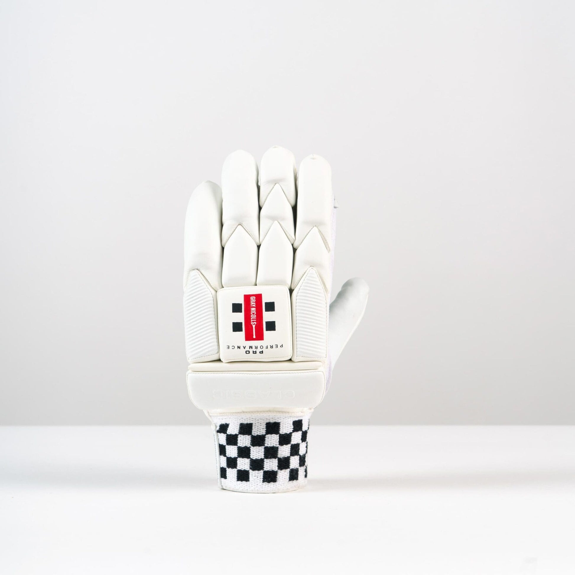 Backhand of Gray-Nicolls Classic Pro Performance Glove with red GN logo and multi-flex finger protection