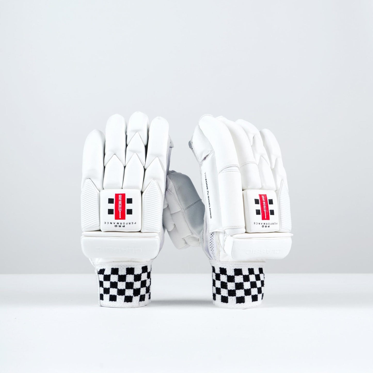 Gray-Nicolls Classic Pro Performance Batting Gloves in white, showing full front and back design with red logo and checkered cuff
