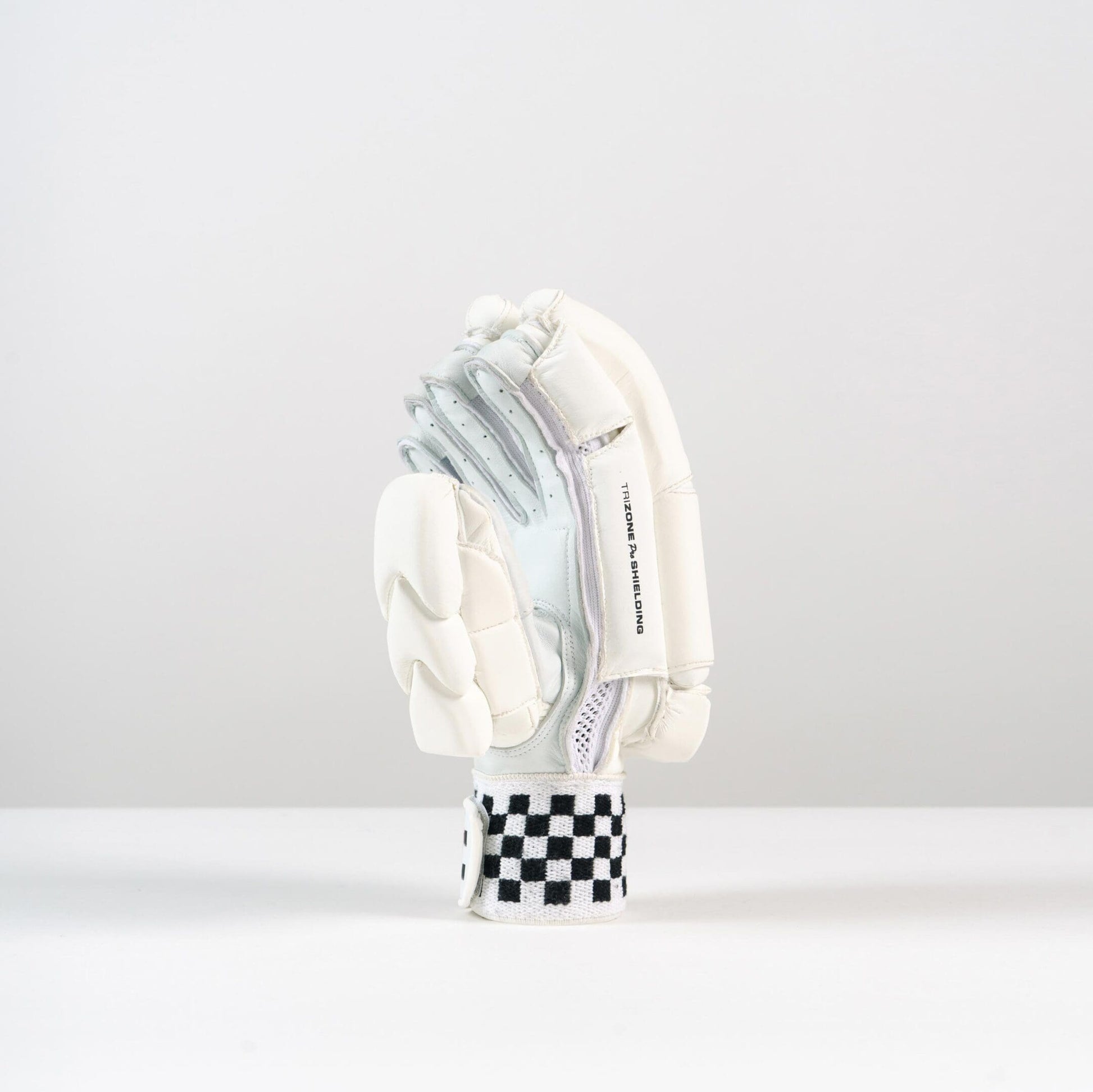 Close-up of the checkered wristband on the Gray-Nicolls Classic Pro Performance Glove