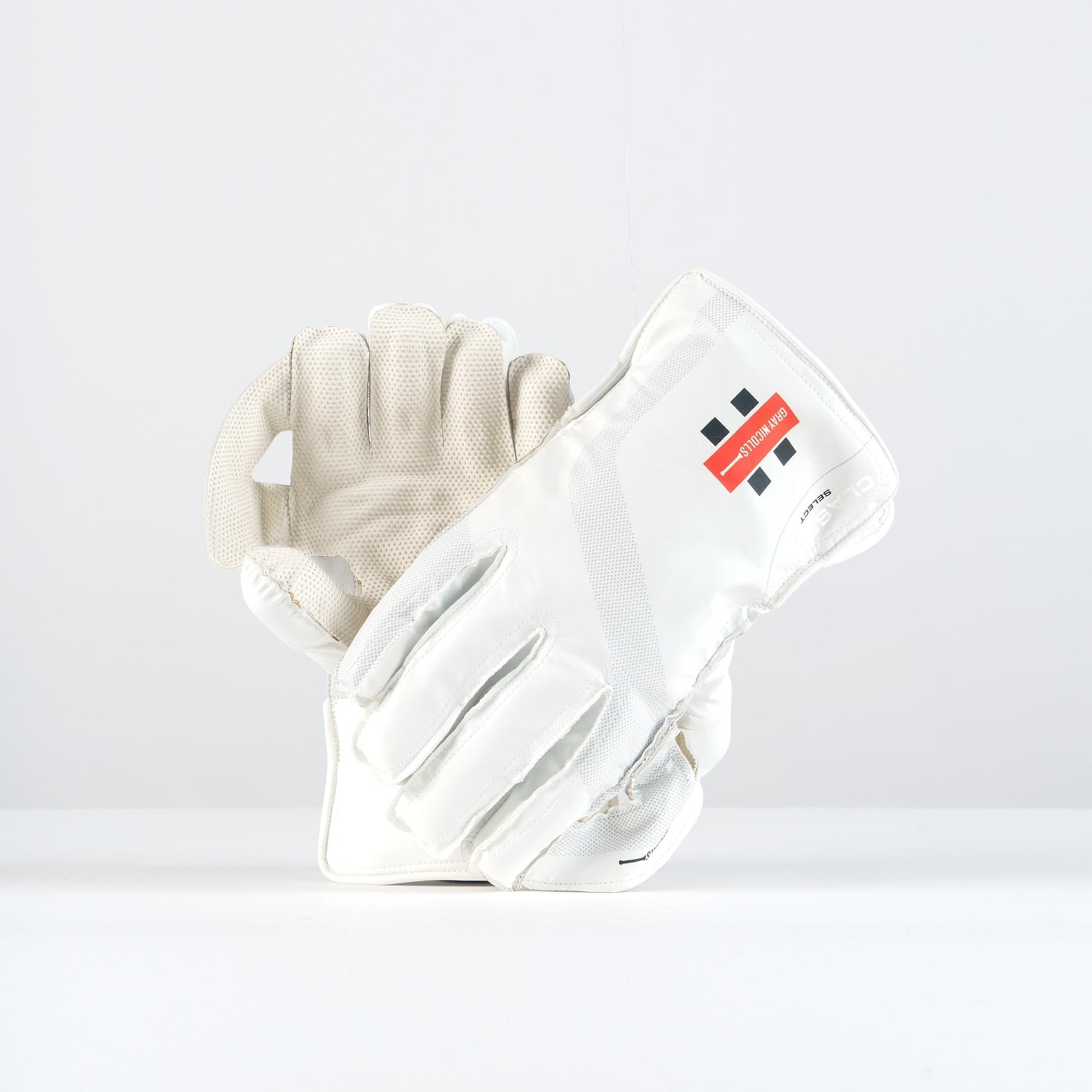 Gray-Nicolls Classic Select wicketkeeping gloves showing palm grip and backhand design with classic logo