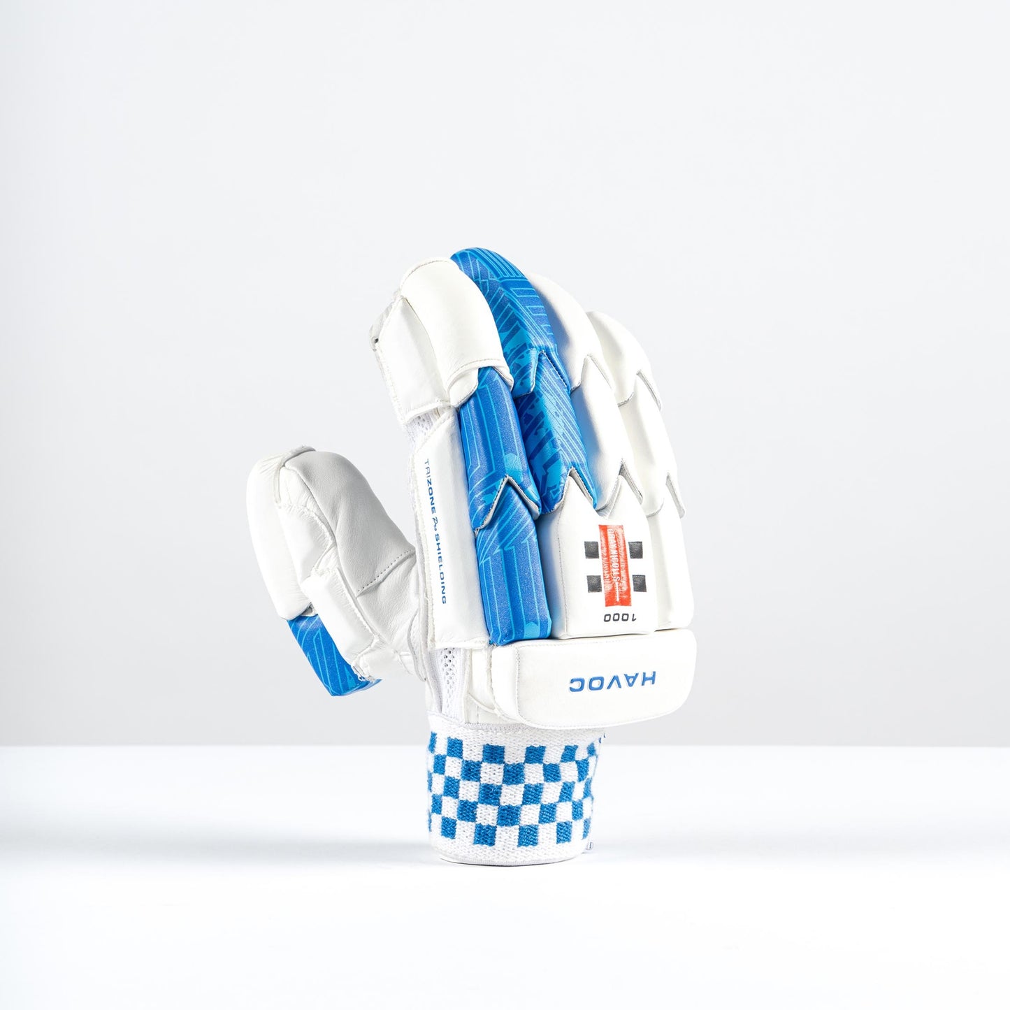 side view of Gray Nicolls Havoc 1.0 gloves displaying side bar protection and ergonomic profile