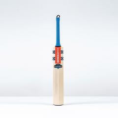 Front view of the Gray-Nicolls Havoc Gen 1.0 Test Cricket Bat (2026) featuring blue handle, red and black decals, and English Willow blade.