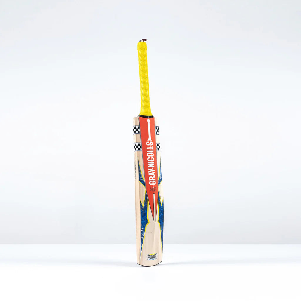 angled view of Havoc HB317 Junior Bat showing mid-blade profile and branding