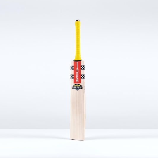 front view of Gray Nicolls Havoc HB317 Pro cricket bat with yellow grip and red decals