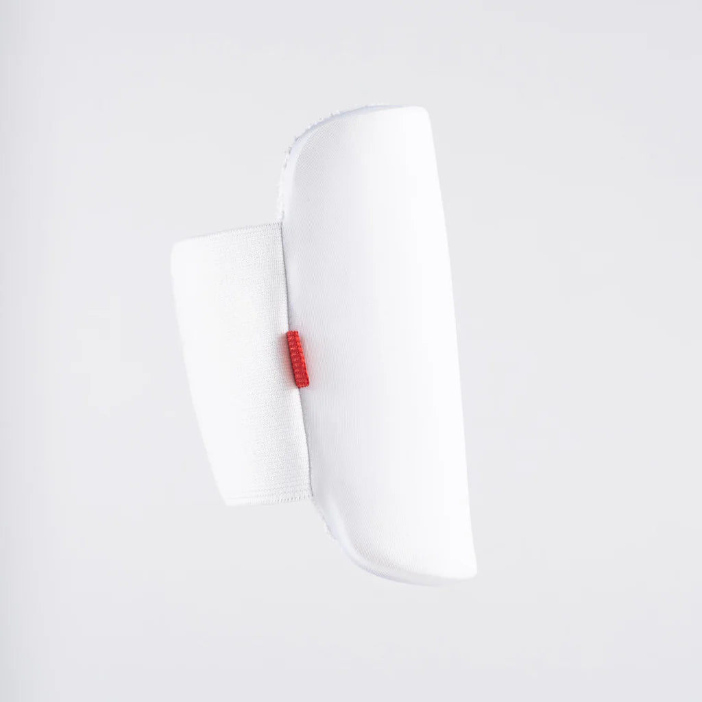 front view of Gray-Nicolls Mini Pro Performance Armguard in white with red strap