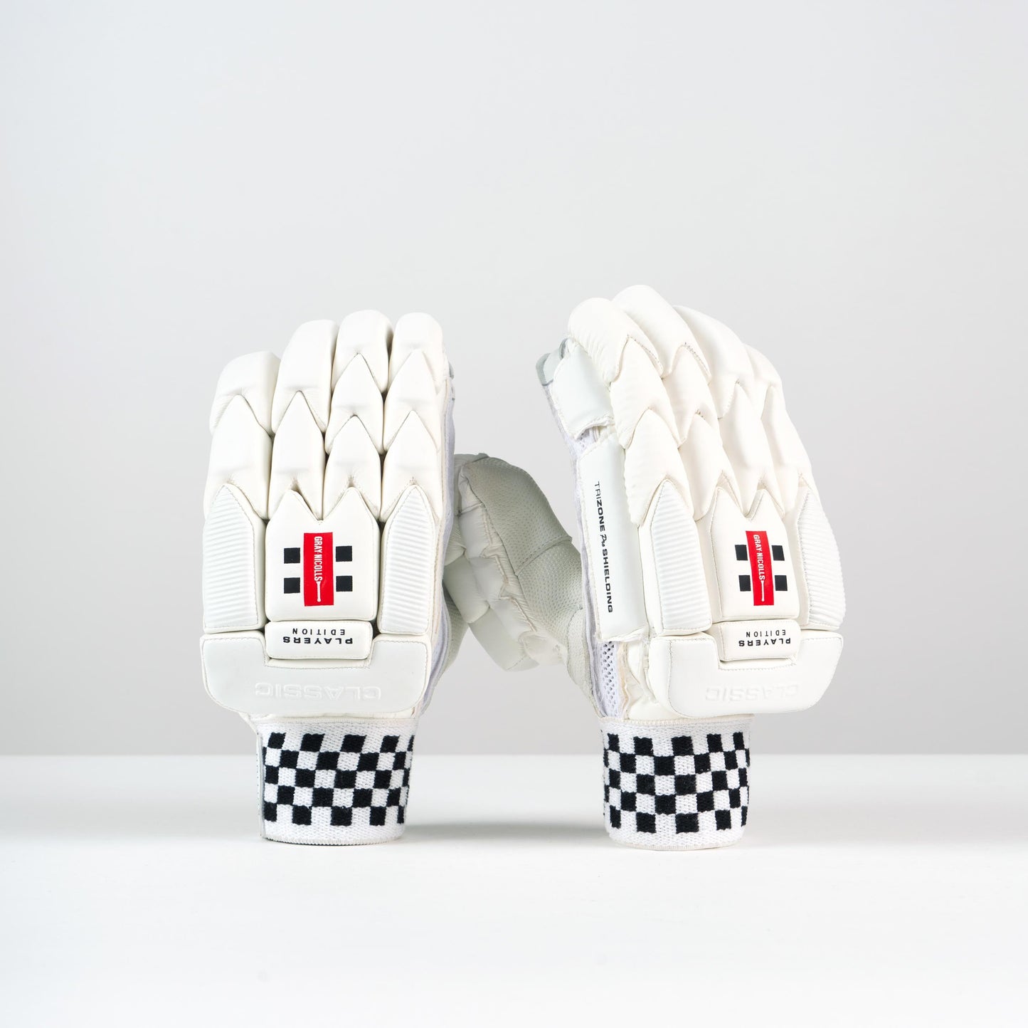 front view of Gray-Nicolls Classic Player Edition Batting Gloves with red logo and checkered wristband