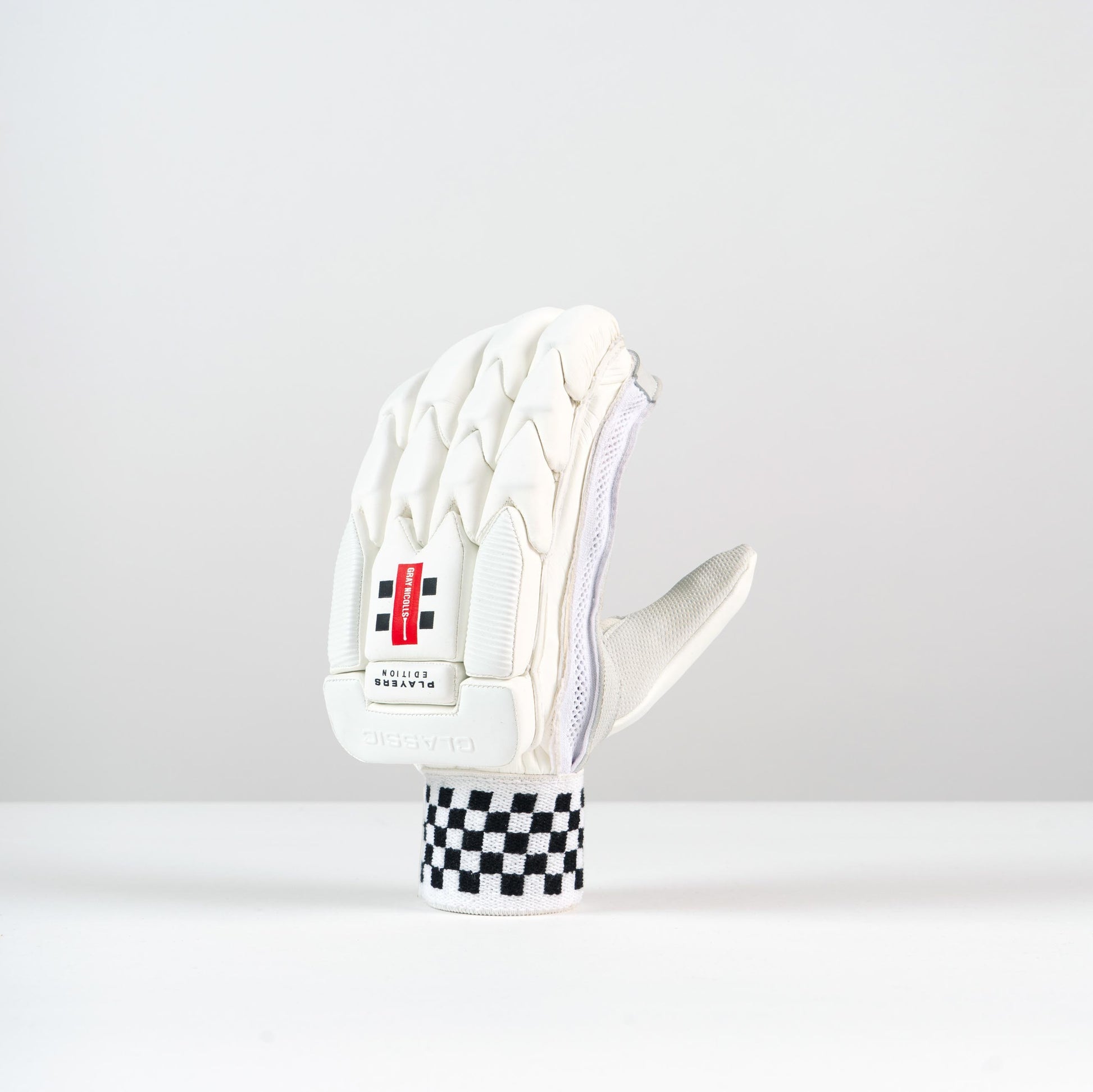 angled view of left-hand Classic Player Edition glove showing finger and thumb protection