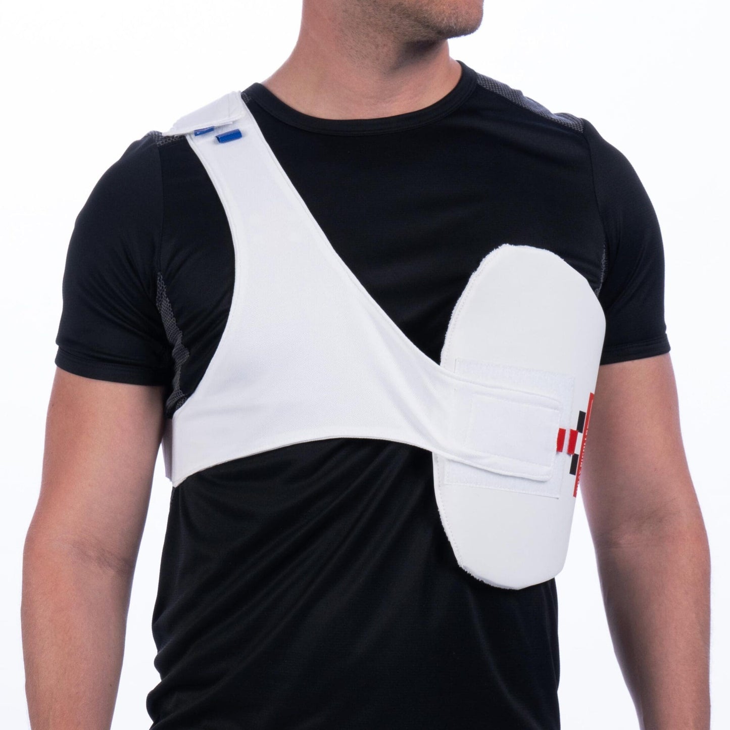 Side view of Gray-Nicolls upper body guard showing contoured protection across ribs and shoulder