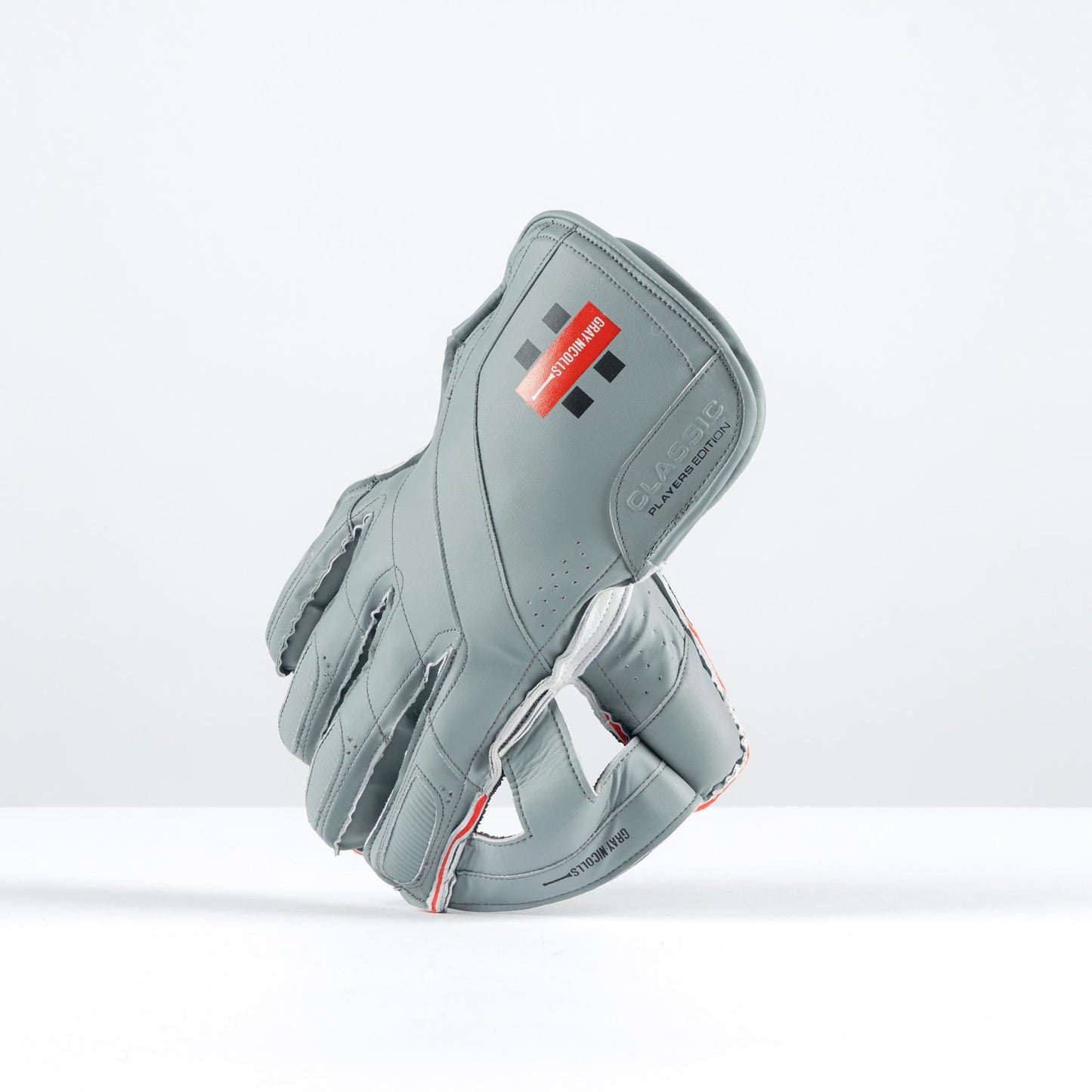 angled side view of Gray-Nicolls Classic Pro Performance gloves showing grey leather finish