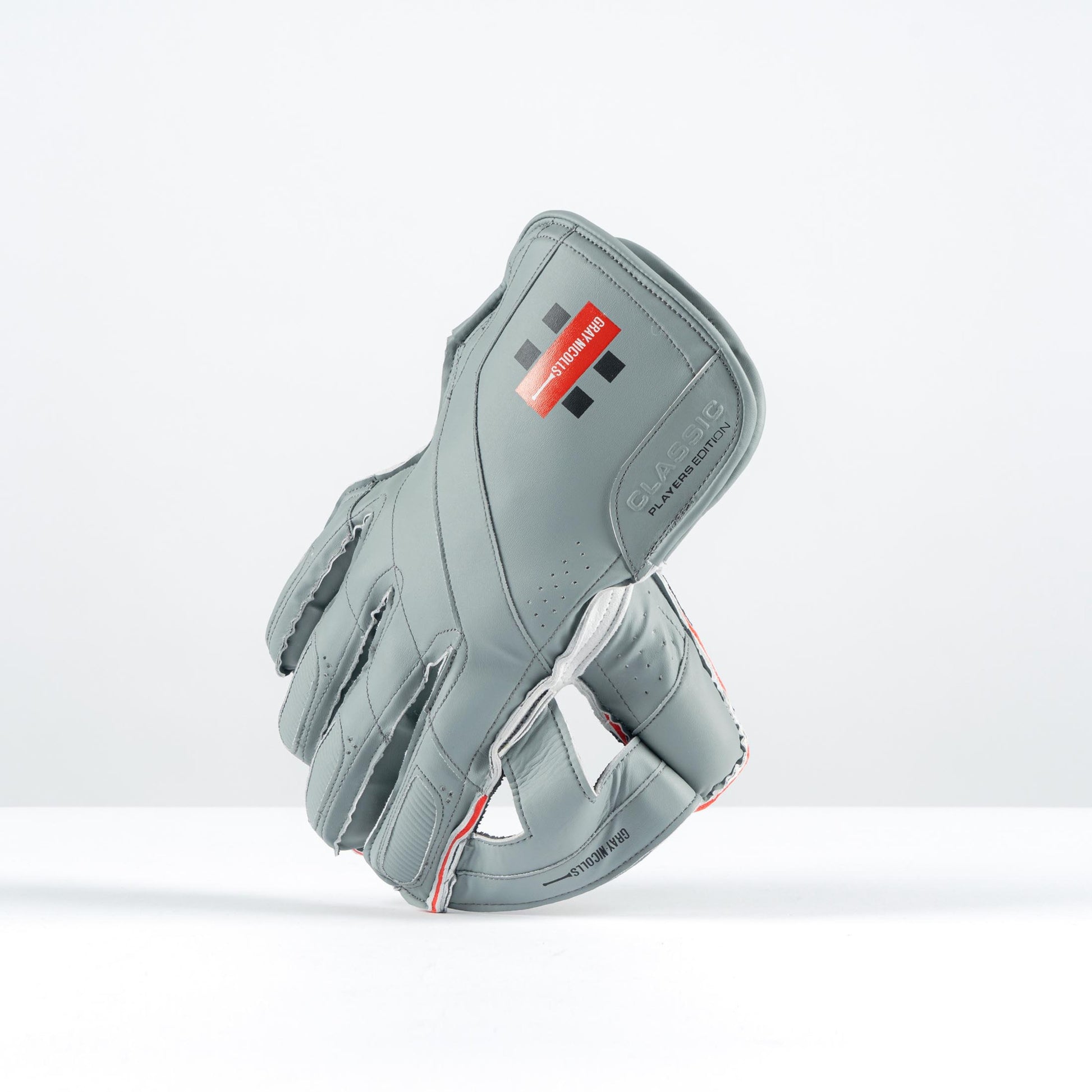 angled side view of Gray-Nicolls Classic Pro Performance gloves showing grey leather finish