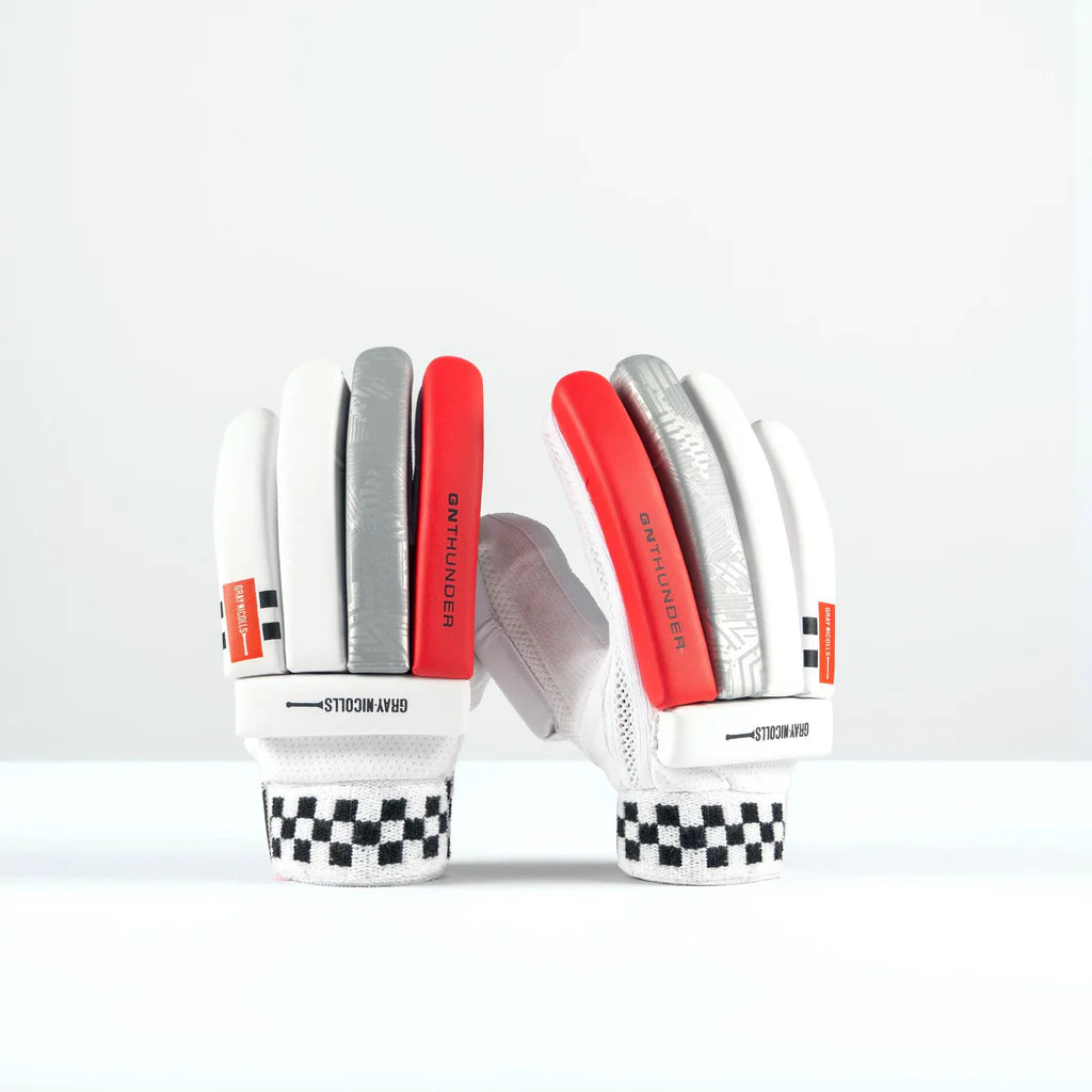 front view of Gray-Nicolls Thunder Junior Batting Gloves with red and grey accents