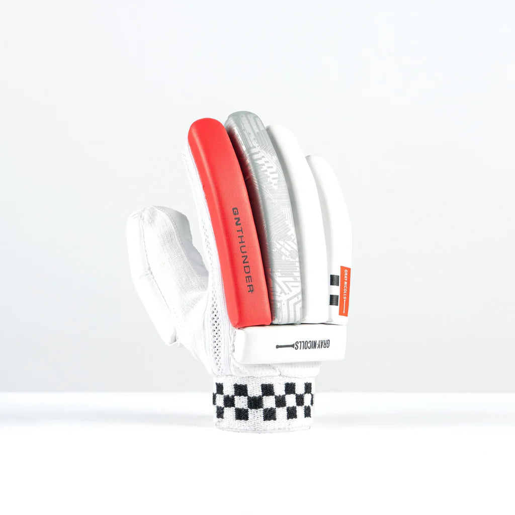 angled view of right-hand Gray-Nicolls Junior Batting Glove with red and white finish