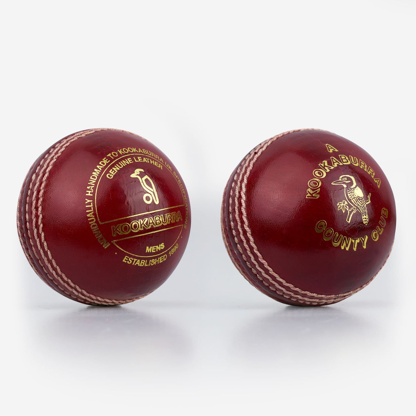 Kookaburra County Club red leather cricket balls showing front and back views with gold embossed branding