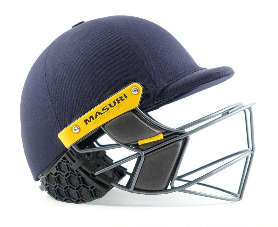 Masuri StemGuard Elite Senior attached to navy helmet side view with secure fit