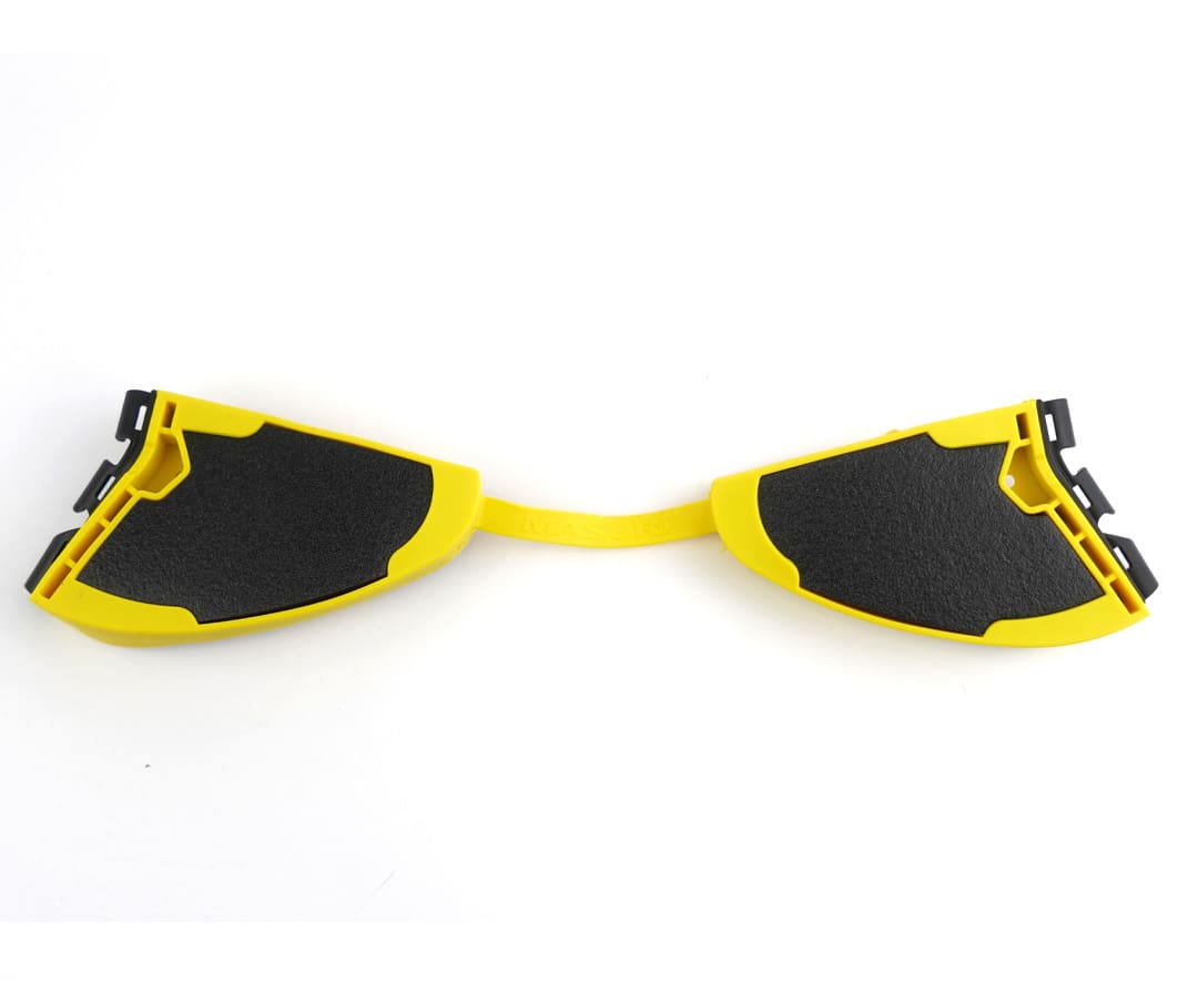 Top-down view of connected Masuri StemGuard Lite Junior pads ready to attach to helmet