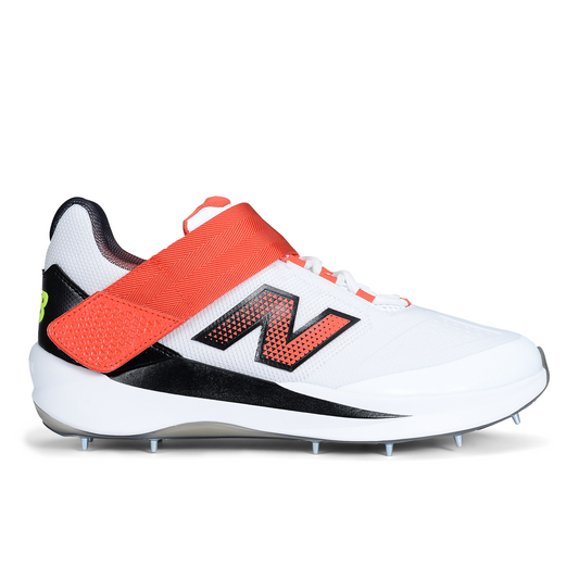 Side profile of New Balance CK4040F7 cricket shoe