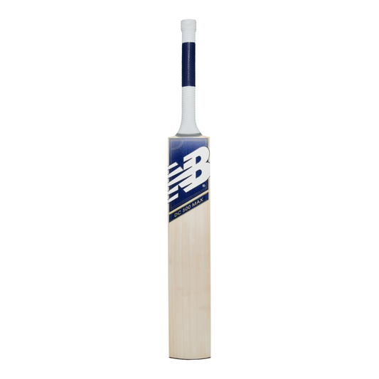 Front view of the New Balance DC 500 MAX cricket bat showing DC branding and blade profile.