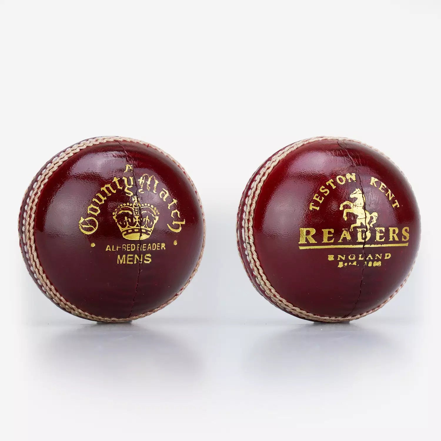 Readers County Match men's red leather cricket balls with gold crown branding and hand-stitched seam