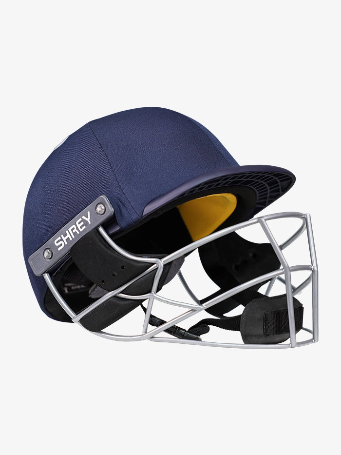 Angled view of Shrey Elite Pro Stainless Steel Fixed Visor Senior Batting Helmet showing compact visor and design.