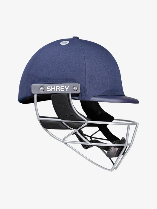Side profile of Shrey Elite Pro Stainless Steel Fixed Visor Senior Batting Helmet in navy blue with stainless steel grill.