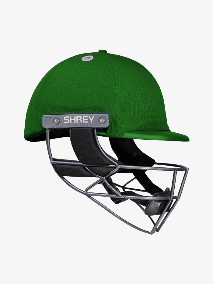 Shrey Elite Pro Titanium Fixed Visor Senior Batting Helmet in green with titanium grill.