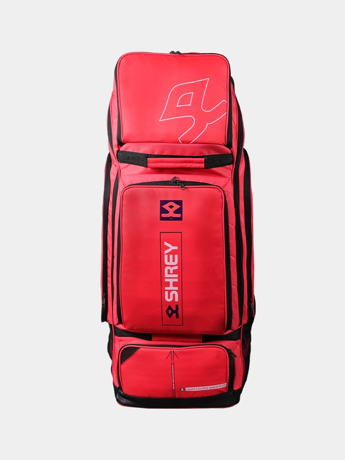 Red variant of the Shrey Legacy Duffle Wheelie 120 standing upright