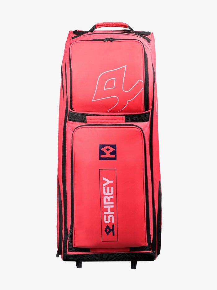 Side profile of the bag in red showing compartments and structure