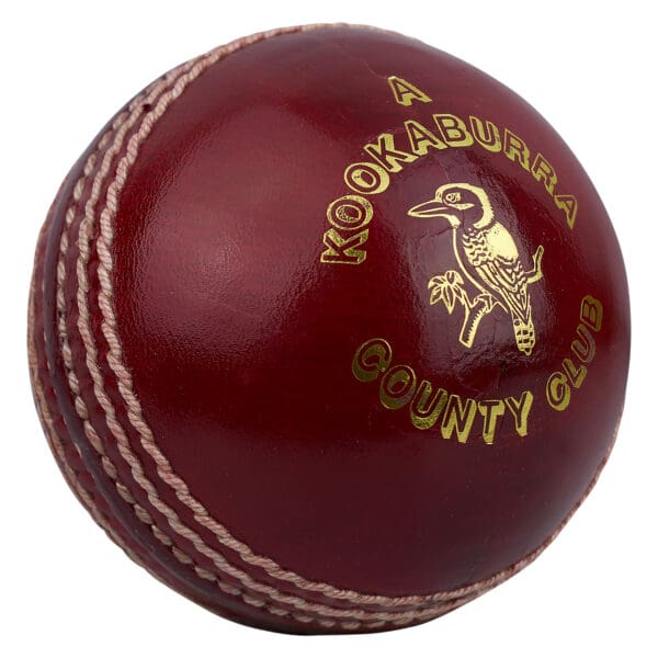 Close-up of Kookaburra County Club Cricket Ball showing gold logo and detailed seam finish