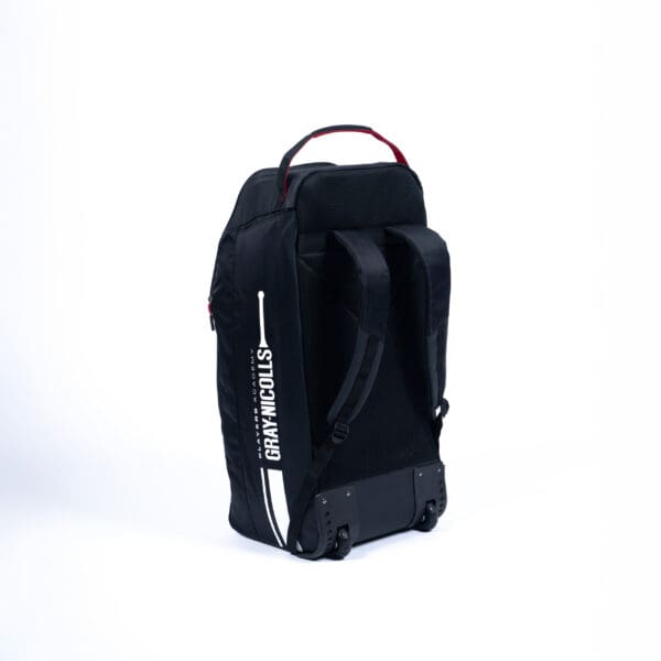 Rear view of Gray-Nicolls Players Academy Wheelie Duffle showing padded straps and wheel base