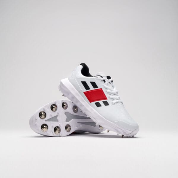Pair of Gray-Nicolls Revo Pro 1.0 Spike Cricket Shoes showing upper and sole design