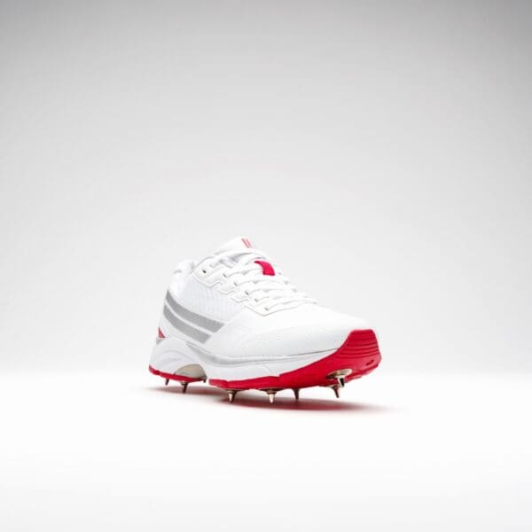 Quarter front angle of Gray-Nicolls Velocity 5.0 Spike Shoe with red toe grip